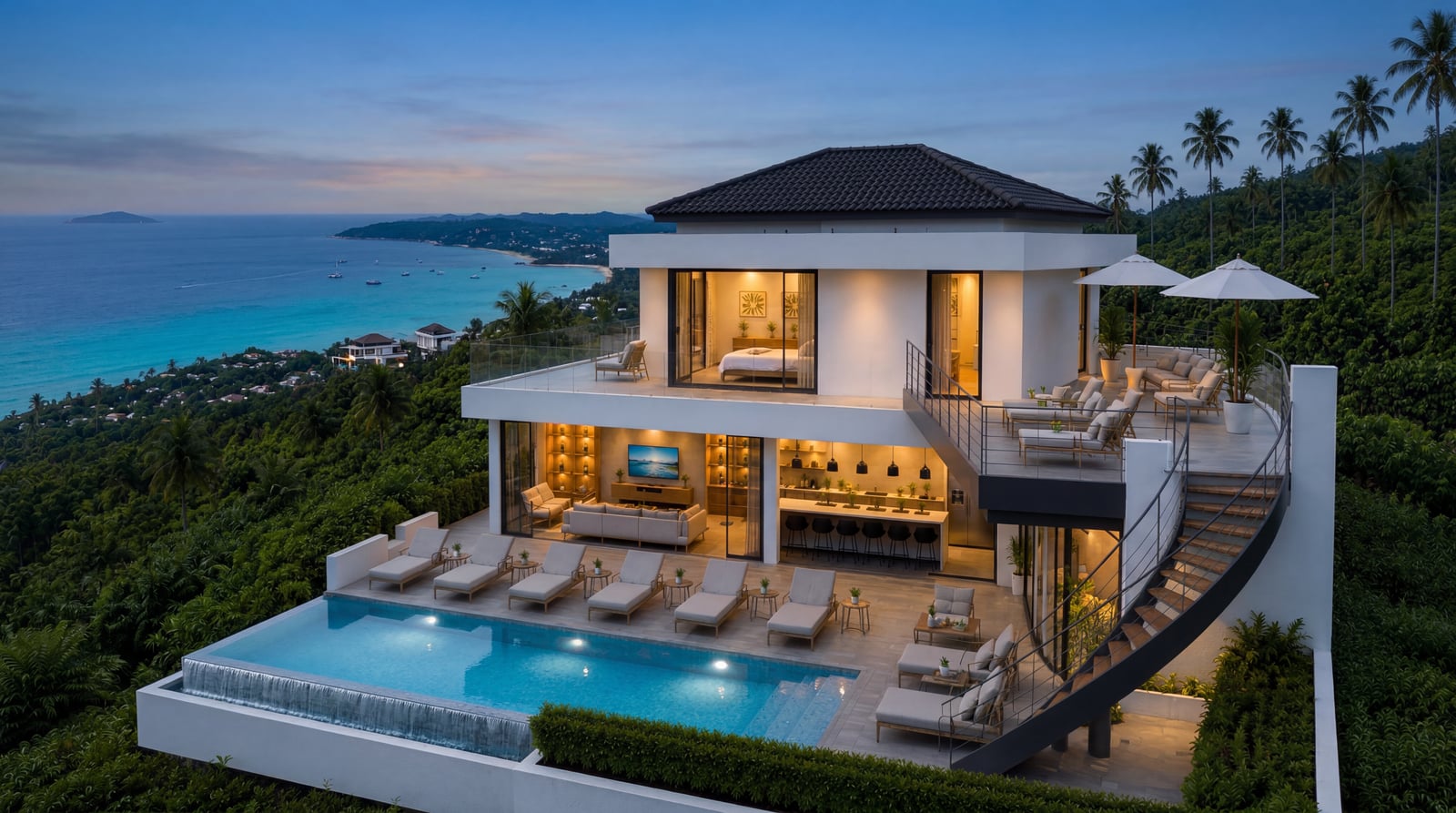 Pool deck aerial — sun loungers, umbrella seating, Chaweng bay panorama